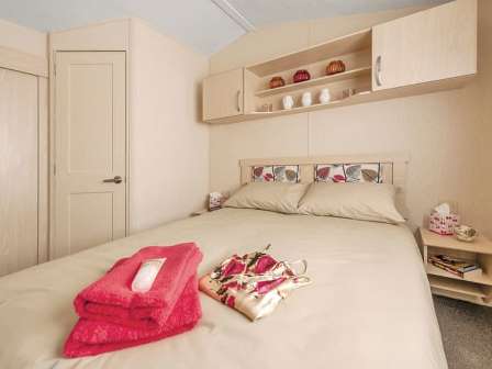 Caravan bedroom at Lime Tree Park in Derbyshire