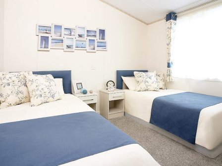 Luxury lodge bedroom at Away Resorts