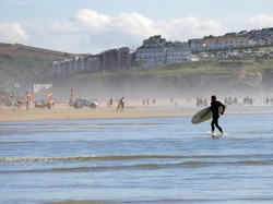 Surfers at Penhale sands Cornwall