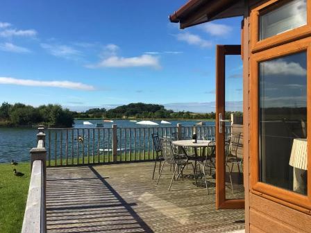 Accommodation overlooking water at Ream Hills Holiday Park