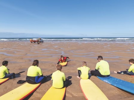 Surf school at Perran Sands Holiday Park in Cornwall